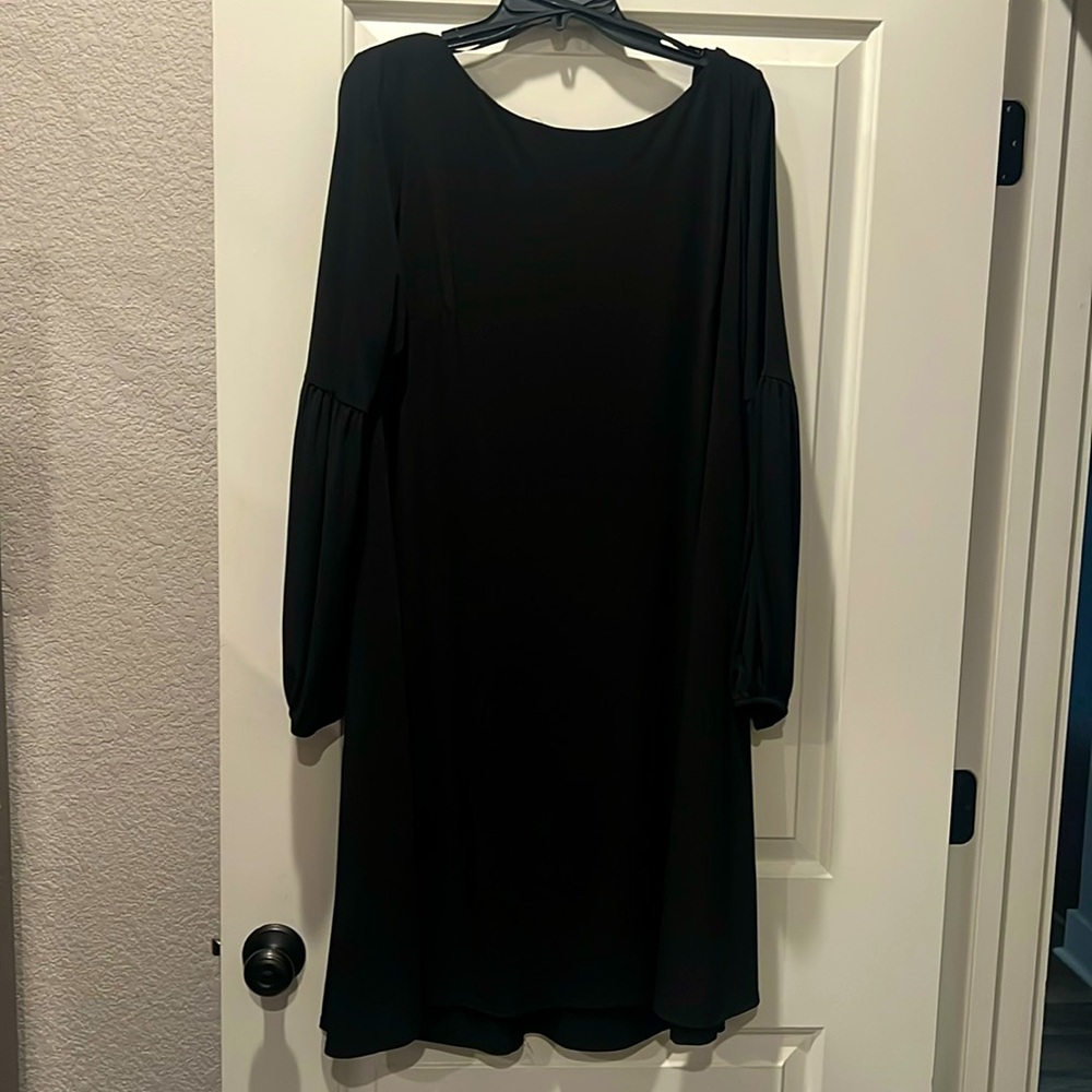 Dress, babydoll style, hits right at middle of knee